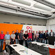 Gruppenfoto in Besprechungsraum